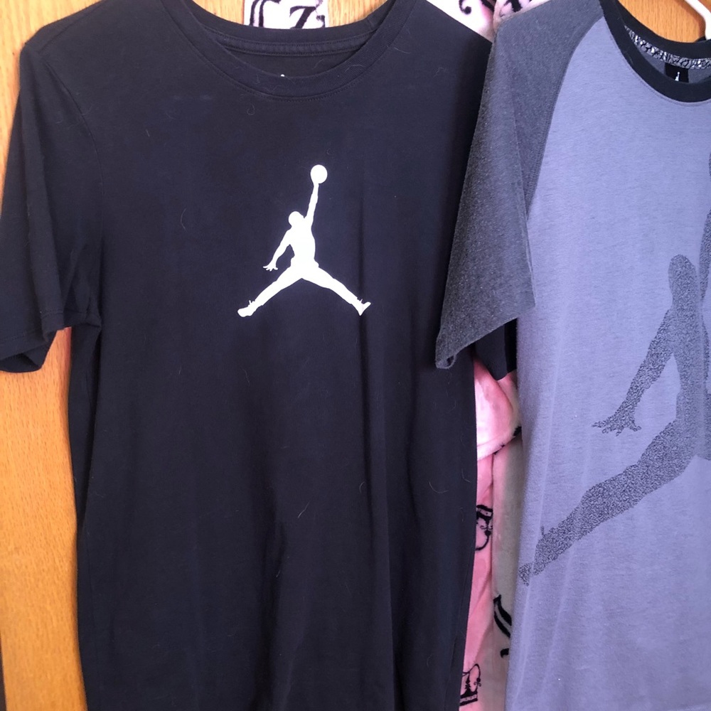 2 Jordan shirts